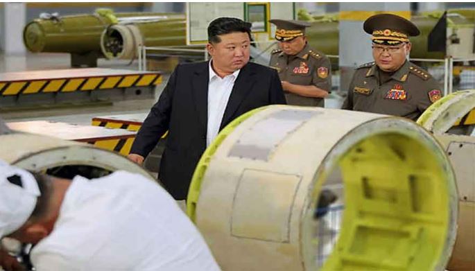 North Korean leader inspects new missile factory ahead of visit to China