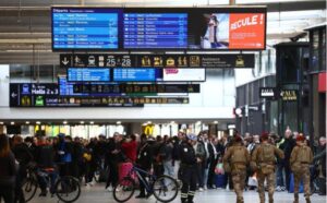Paris police shoot and wound man with knife at Montparnasse station