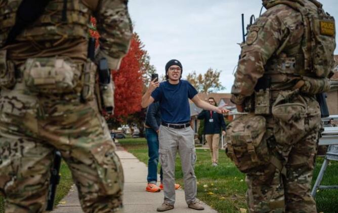 ‘We’re not a violent city’: Chicago locals take on ICE block-by-block