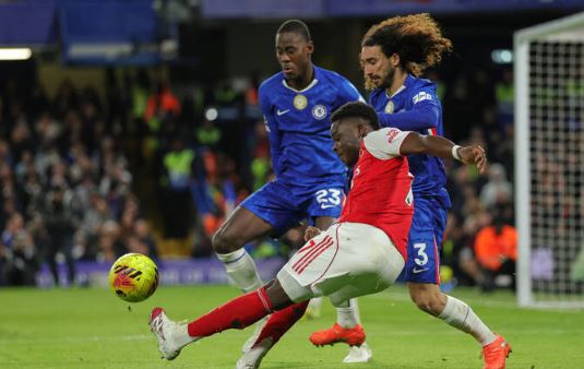 Arsenal held by 10-man Chelsea, Isak ends drought to fire Liverpool