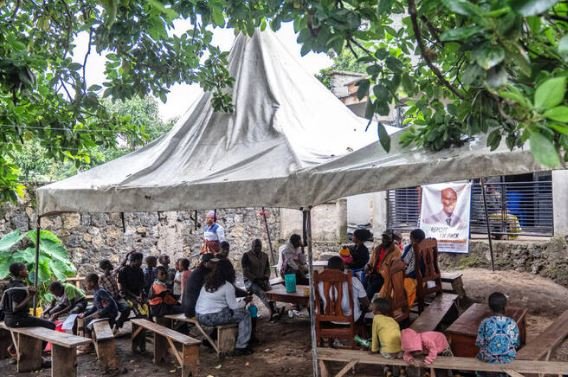 Families mourn those killed in a Congo mine landslide as some survivors prepare to return