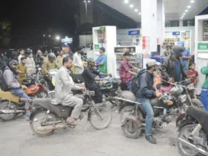 Pakistani officials demonstrate the new mobile application for fuel subsidies that will deliver targeted petrol support to two- and three-wheeler owners through digital vouchers and QR code verification.