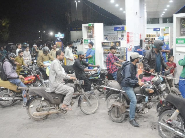 Pakistani officials demonstrate the new mobile application for fuel subsidies that will deliver targeted petrol support to two- and three-wheeler owners through digital vouchers and QR code verification.