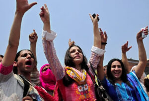 Transgender community members and police oversee burial of Sara, a transgender woman killed in Peshawar's Faqirabad area.