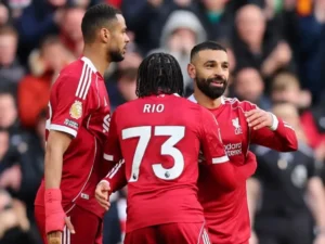 Rio Ngumoha celebrates becoming Liverpool's youngest Premier League goalscorer at Anfield in 2-0 win over Fulham.