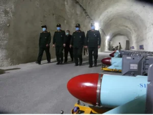 Iranian Revolutionary Guards military imagery amid escalating warnings over possible renewed US attacks and Middle East conflict tensions.