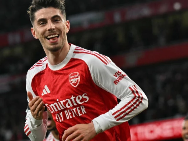 Arsenal players celebrating Kai Havertz’s goal during a tense Premier League victory over Burnley at the Emirates Stadium.