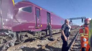 One dead and dozens injured after two trains crash North of London